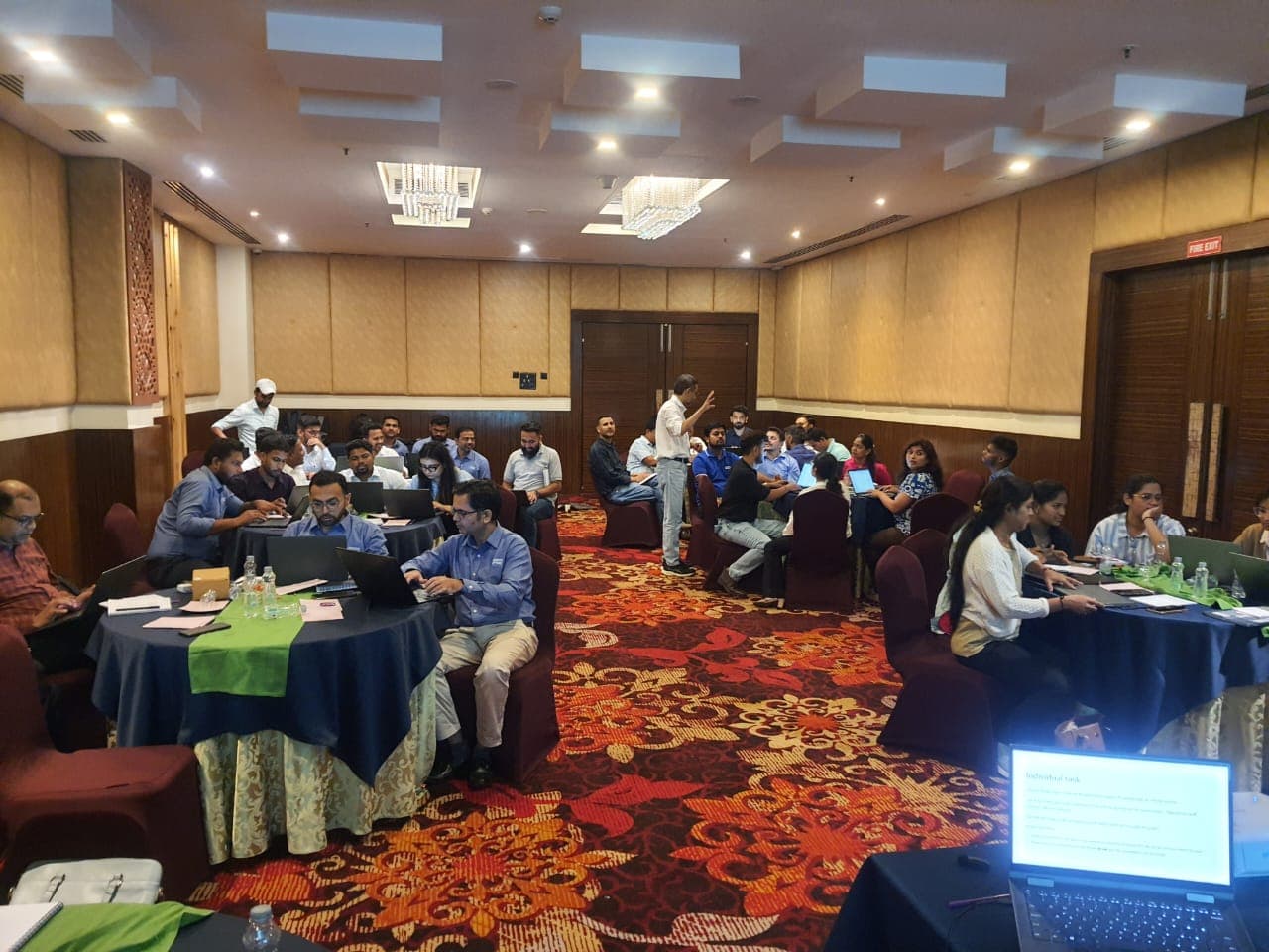 Team seated, working together